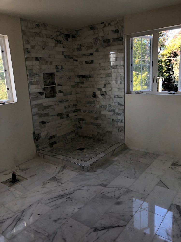 Finished marble shower remodel in a Los Angeles home
